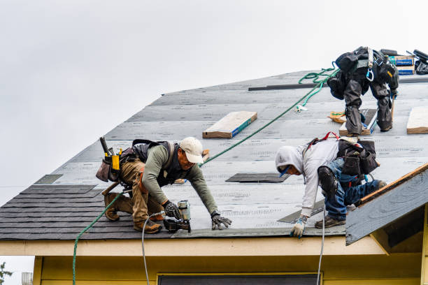 Professional Gutter Installation technician working in Marlborough, MO